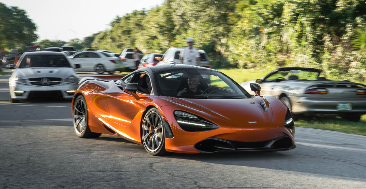 Orange McLaren 720S leaving duPont Registry